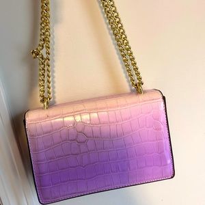 Purple cross body purse with gold accents